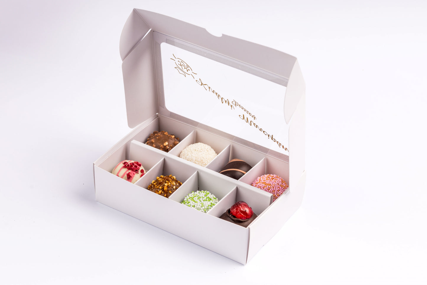 Díszdoboz 8 darab válogatott marcipánnal. Gift box with 8 pieces of assorted marzipan. Geschenkbox mit 8 Stück ausgewähltem Marzipan.